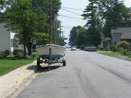 Boat parked on street